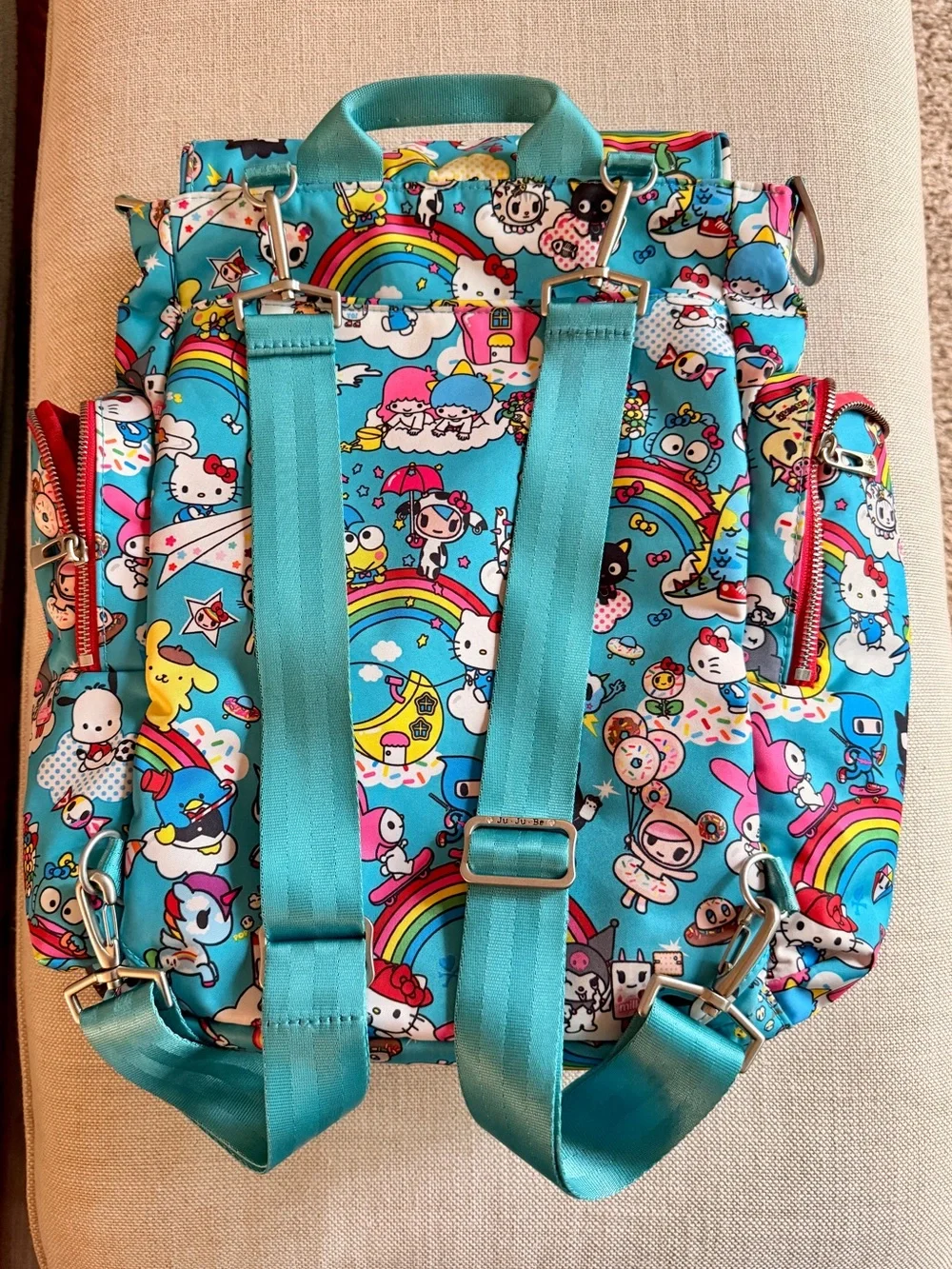 tokidoki x Hello Sanrio for JujuBe Baby Backpack - Bright Blue Rainbow Print